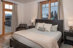 The 2nd bedroom has a king bed, walkout access to the patio & ensuite with steam shower and heated floors.